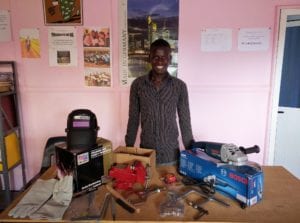 WAVS welding student with a New Entrepreneurs Program welding kit