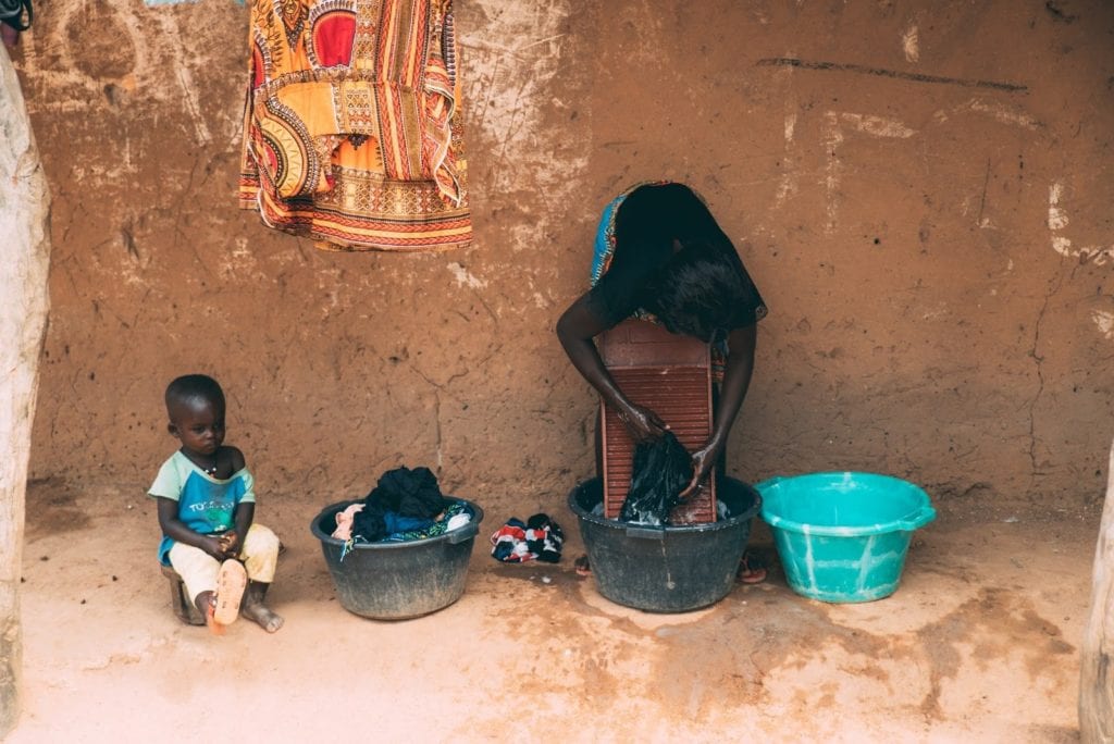 a woman and child in Guinea-Bissau West Africa