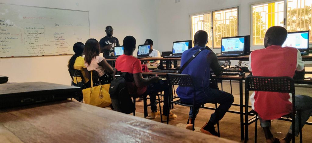 Students using computers in a Computer Literacy class at a WAVS school in Guinea-Bissau