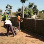 Construction continues on the security wall around the campus. The wall will be over a mile long once complete.